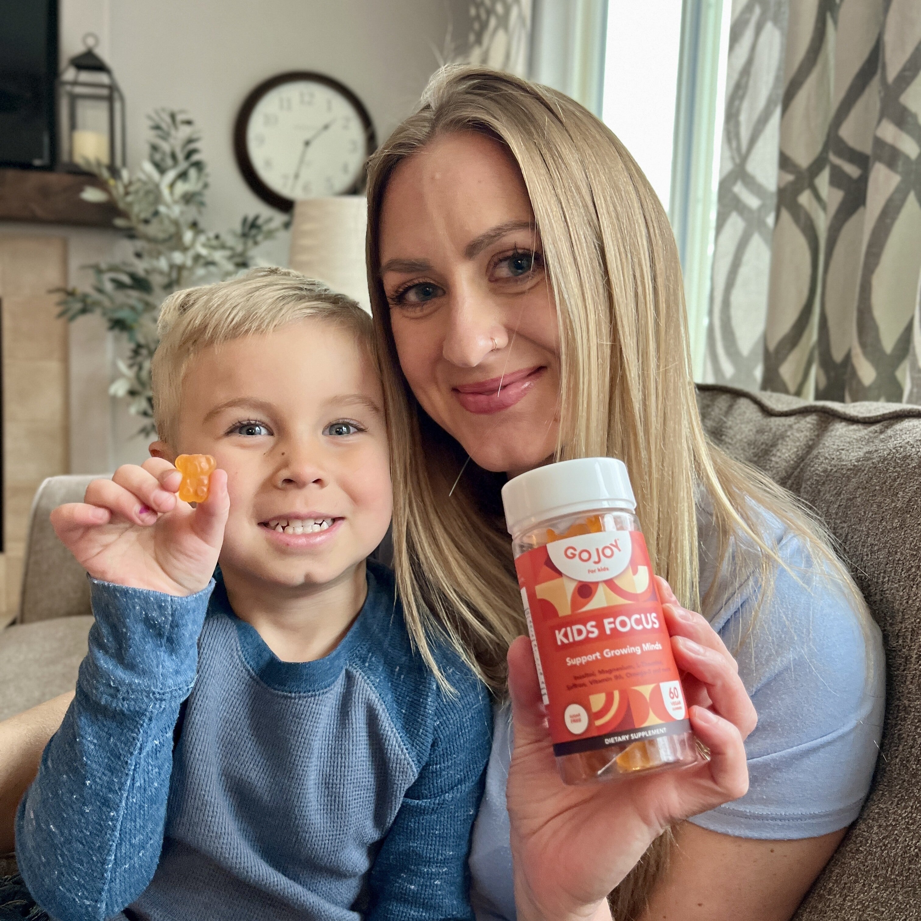 Mom and kids with GOJOY gummies